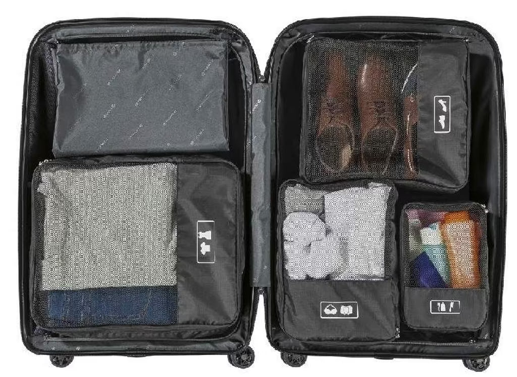 Set of four Topmove travel organizers