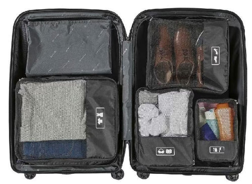 Set of four Topmove travel organizers